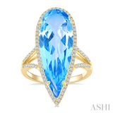 26x9 MM Pear Shape Blue Topaz and 1/3 Ctw Round Cut Diamond Halo Semi-Precious Ring in 14K Yellow Gold