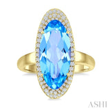 18x8 MM Oval Cut Blue Topaz and 1/3 Ctw Round Cut Diamond Halo Semi-Precious Ring in 14K Yellow Gold