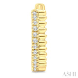 1/10 Ctw Fluted Round Cut Diamond Petite Huggie Earrings in 10K Yellow Gold
