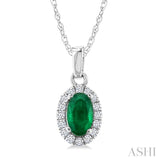 5x3 MM Oval Shape Emerald and 1/20 Ctw Round Cut Diamond Halo Precious Pendant with Chain in 10K White Gold