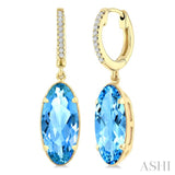 12X5 MM Oval Shape Blue Topaz and 1/10 Ctw Round Cut Diamond Semi-Precious Earrings in 10K Yellow Gold