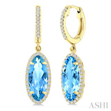 12X5 MM Oval Shape Blue Topaz and 1/3 Ctw Round Cut Diamond Semi-Precious Earrings in 10K Yellow Gold