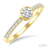 1/2 Ctw Bezel Set Round Cut Diamond Ring in 14K Yellow Gold