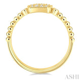 1/8 Ctw Petite Bead Shank Cushion Shape Center Round Cut Diamond Fashion Ring in 10K Yellow Gold
