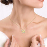 1/4 Ctw Fluted Texture Butterfly Round Cut Diamond Fashion Pendant With Chain in 10K Yellow and White Gold
